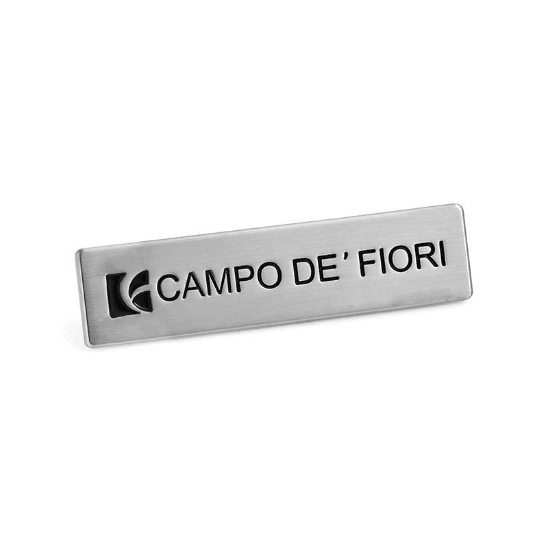 Custom Aluminum Name Tags featuring corporate logo for employee identification