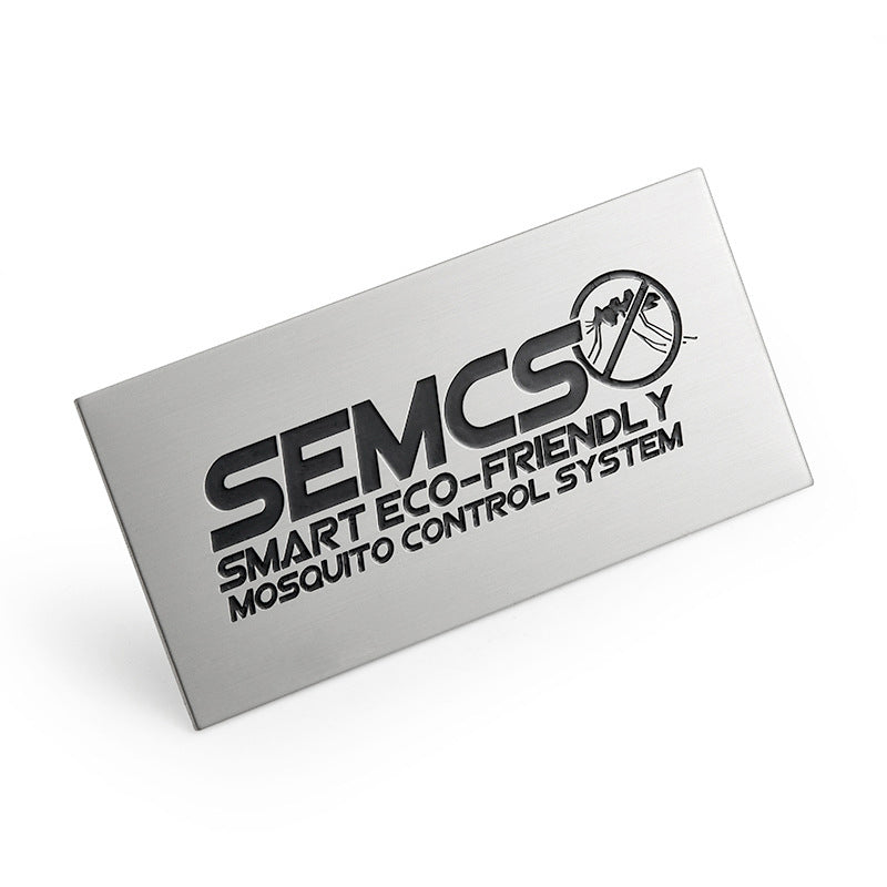 Custom Aluminum Name Tags featuring corporate logo for employee identification