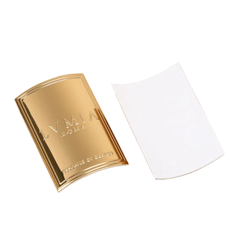 Curved gold custom metal logo plate with adhesive backing