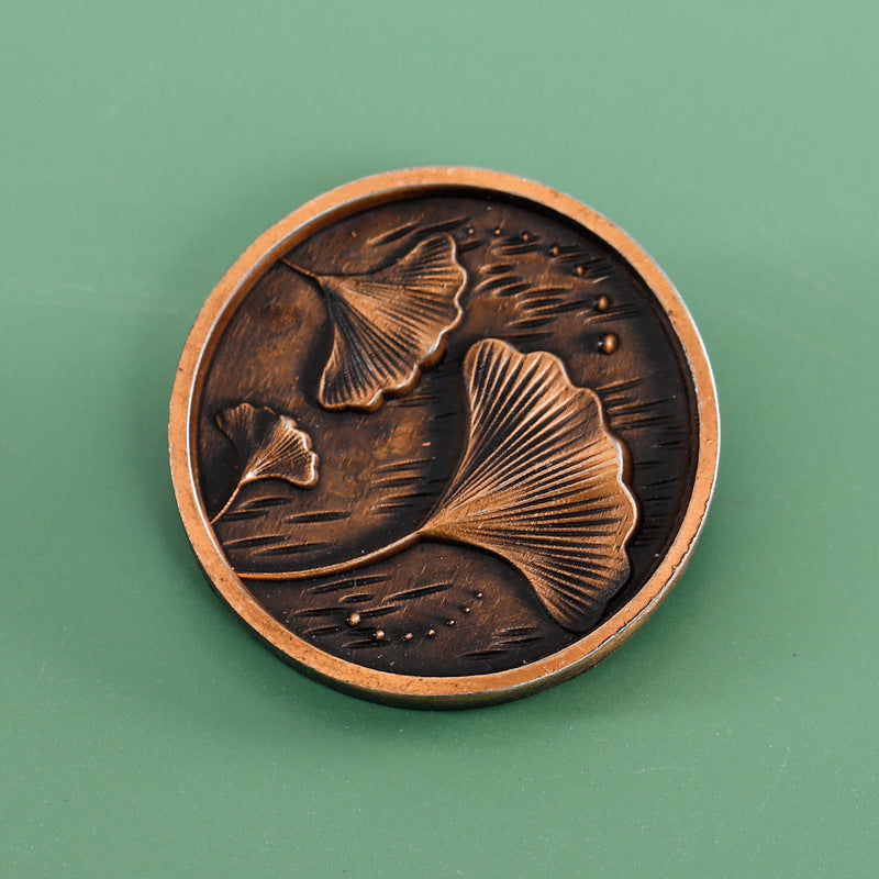 Antique copper custom zinc alloy label with embossed botanical relief