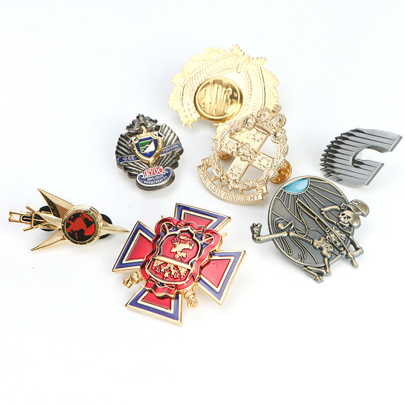 Assorted custom 3D badges and metal emblems