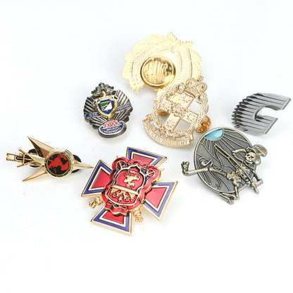 Assorted custom 3D badges and metal emblems