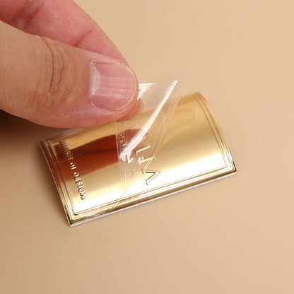 Custom Metal Logo Plates for Packaging & Perfume Bottles - product example 4