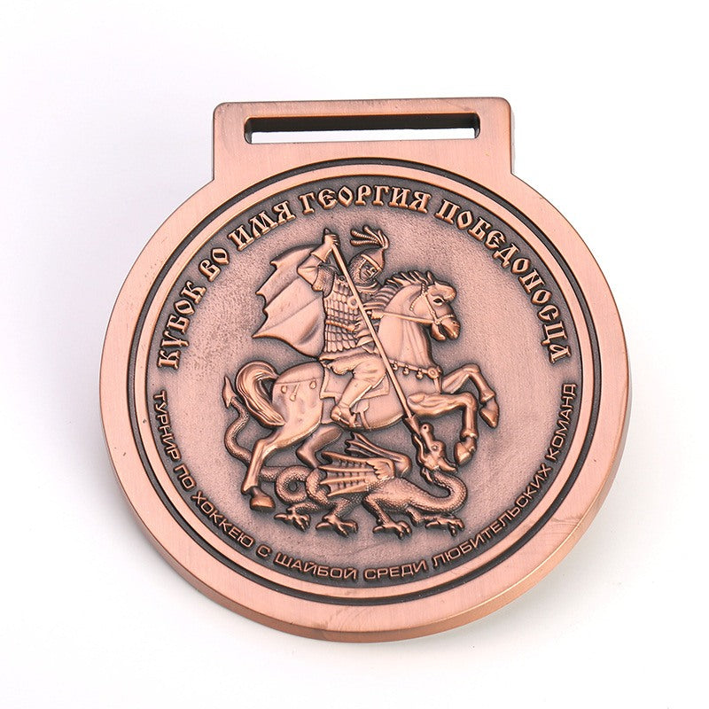 Custom antique bronze medal with detailed 3D relief