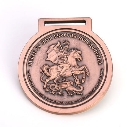 Custom antique bronze medal with detailed 3D relief