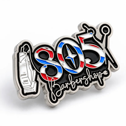 Angled view of custom barbershop soft enamel pin