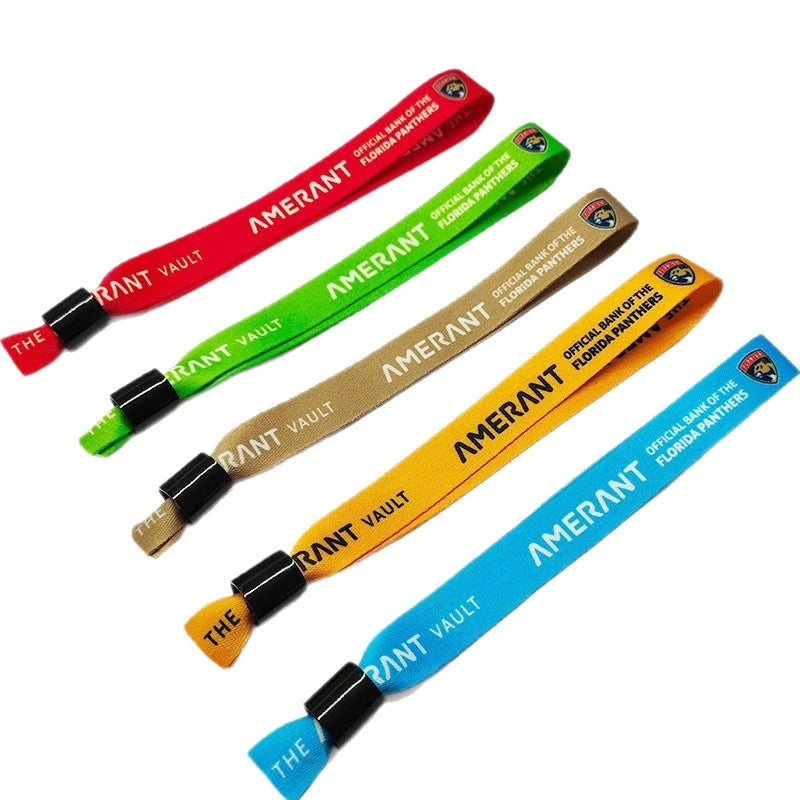 Custom dye sublimation event wristbands in multiple colors on white background